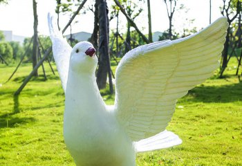 鴿子雕塑-公園草坪創(chuàng)意玻璃鋼樹脂放飛的鴿子雕塑